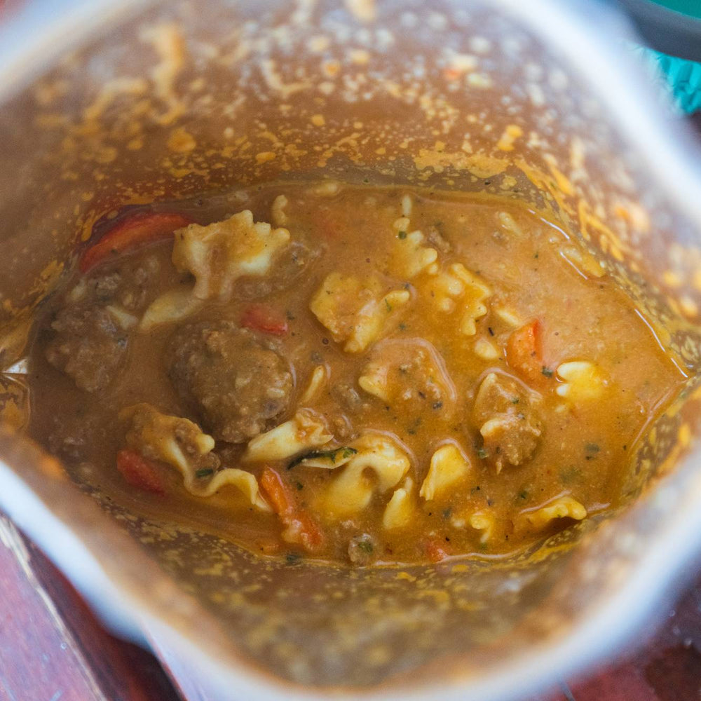 Italian Sausage and Zesty Tomato Sauce with Farfalle Pasta, and Parmesan - Quest Outdoors